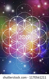 Astrological New Year 2019 Greeting Card or Calendar Cover on Cosmic Background inside of Flower of Life sacred geometry interlocking circles symbol.
