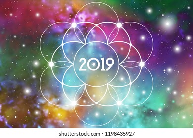 Astrological New Year 2019 Greeting Card or Calendar Cover on Cosmic Background inside of Flower of Life sacred geometry interlocking circles symbol.