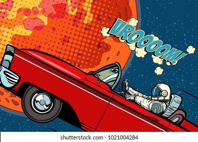 Astronaut in a car over the planet Mars. Pop art retro vector illustration comic cartoon hand drawn vector