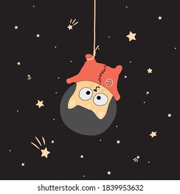 The astronaut cat is hanging. On a string. Against the background of the starry sky.