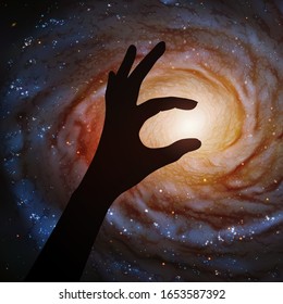 Astronaut hand holding center of spiral galaxy in outer space. Vector illustration with hand silhouette and astronomical object in cosmos. Starry background. Elements of this image furnished by NASA