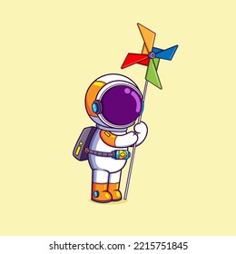 El astronauta está sosteniendo un gran molino de viento a la vez que está de pie