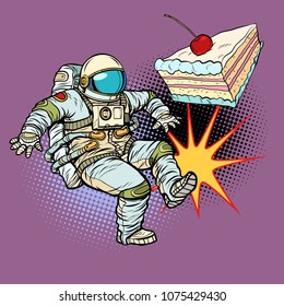 Astronaut kicks a piece of cake. Pop art retro vector illustration cartoon comics kitsch drawing