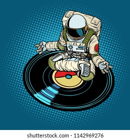 Astronaut Man Meditates To Music, Yoga. Pop Art Retro Vector Illustration Kitsch Vintage