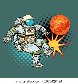 Astronaut playing football Mars. Pop art retro vector illustration cartoon comics kitsch drawing