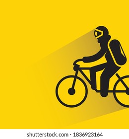 astronaut riding bicycle on yellow background