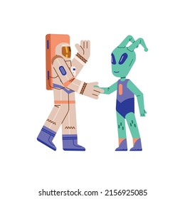 Astronaut and space alien meeting, flat cartoon vector illustration isolated on white background. Astronaut and green friendly alien greet with a handshake.