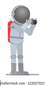 Astronaut takes pictures. Vector illustration, flat design style. Isolated on a white background.