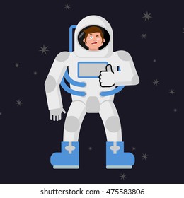 Astronaut Thumbs up showing ok. Cosmonaut winks. Sign all right. Open dark space and stars