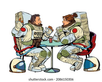 Astronauts man and woman couple date in a cafe. Meeting two friends