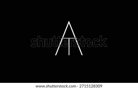 AT, TA ABSTRACT LETTER LOGO MONOGRAM