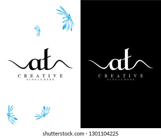 at, ta letter logo design vector