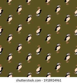 Athlantic seamless zoo pattern with little puffin bird elements print. Green olive background. Creative artwork. Flat vector print for textile, fabric, giftwrap, wallpapers. Endless illustration.