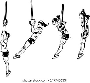 The athlete doing an exercise on the rings