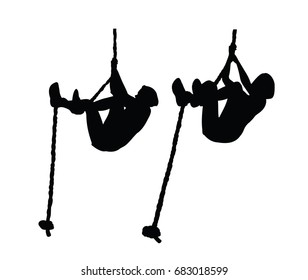 athlete girl doing gymnastic exercise climbing the rope