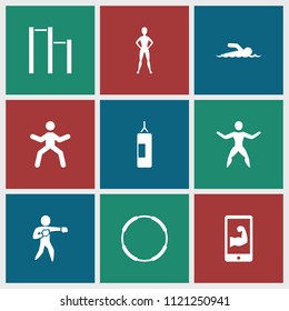 Athlete icon. collection of 9 athlete filled icons such as karate, muscular arm  on phone, swimmer, man doing exercises, hoop. editable athlete icons for web and mobile.