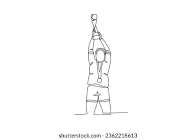 An athlete lifts his trophy. Spain's women's football team victory
