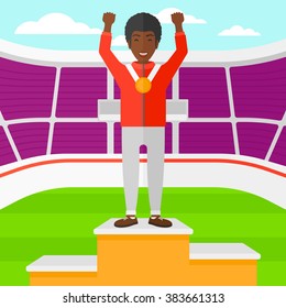 Athlete with medal and hands raised.