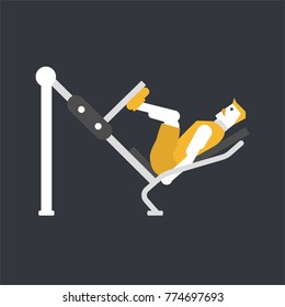 Athlete performs exercises on the simulator for the press legs