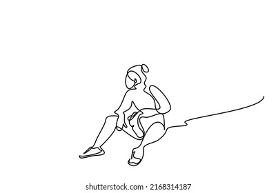 an athlete runner beautiful fit woman is sitting and drinking water