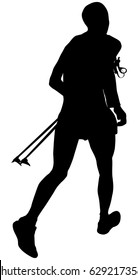 athlete skyrunner with trekking pole in hand running mountain marathon