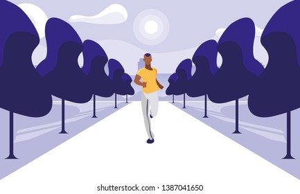 athletic afro man running in the park