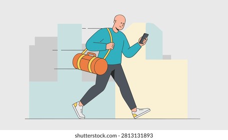 Athletic bald man carrying a gym bag while walking through a city and looking down at his mobile phone screen.