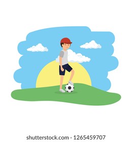 athletic man playing soccer in the camp