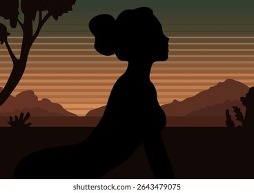 Athletic woman doing yoga, arching her back. Yoga practice at twilight against evening mountains. Recreation and healthy lifestyle concept.