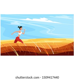 Athletic woman sprinter running. Beautiful woman in sportswear. Sport motivation and healthy lifestyle. Rural landscape with golden hills and blue sky. Outdoor fitness activity and marathon training.