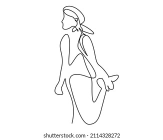 an athletic woman trying to get flexible with warm-up exercises preparing for exercise