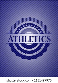 Athletics badge with denim background