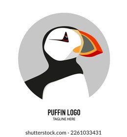 Atlantic puffin’s head flat vector illustration. North fauna, wildlife. Written Puffin. Red Book bird.  Arctic shore seabird, ocean coast inhabitants