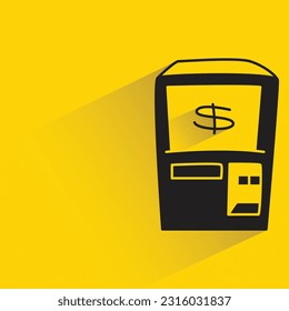 atm with shadow on yellow background
