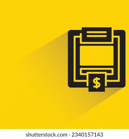 atm con sombra sobre fondo amarillo