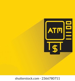 atm with shadow on yellow background