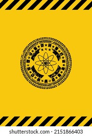 atom icon black grunge emblem inside yellow warning sign. Vector Illustration. Detailed. 