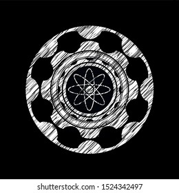 atom icon drawn on blackboard