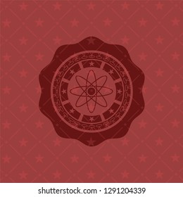 atom icon inside badge with red background