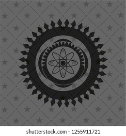 atom icon inside black badge