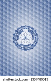 atom icon inside blue badge with geometric pattern background.