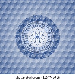 atom icon inside blue emblem with geometric pattern.