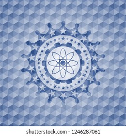 atom icon inside blue emblem with geometric pattern.