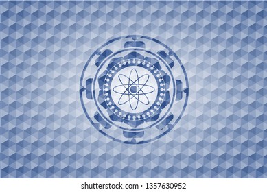 atom icon inside blue polygonal badge.