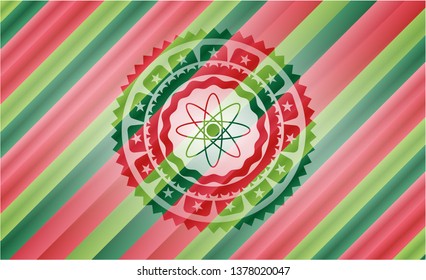 atom icon inside christmas badge background.