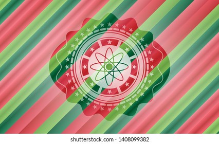 atom icon inside christmas colors style emblem.