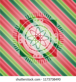 atom icon inside christmas emblem background.