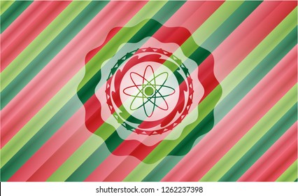 atom icon inside christmas emblem background.