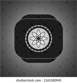 atom icon inside dark emblem