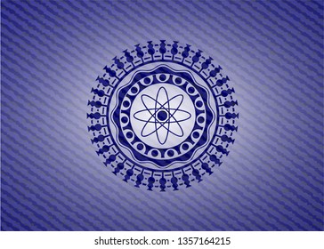 atom icon inside emblem with jean texture